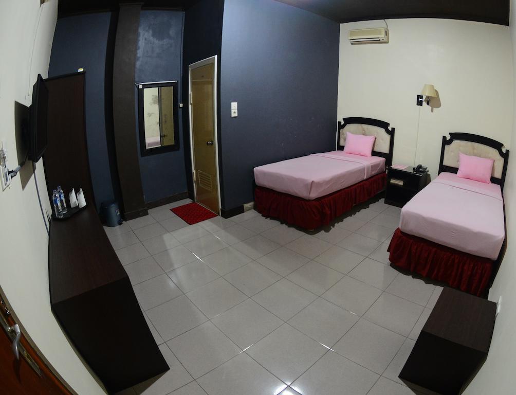 Makassar Mulia Hotel Quarto foto